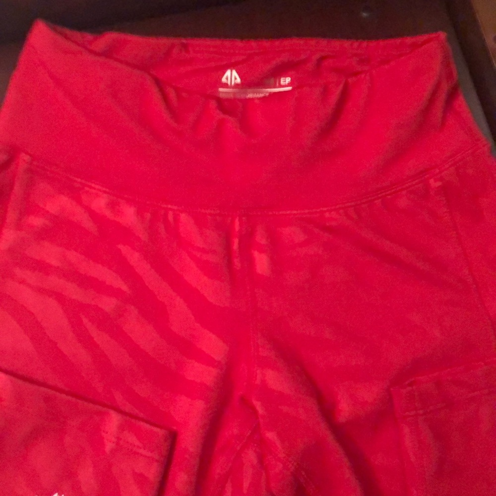 Red Capri leggings.